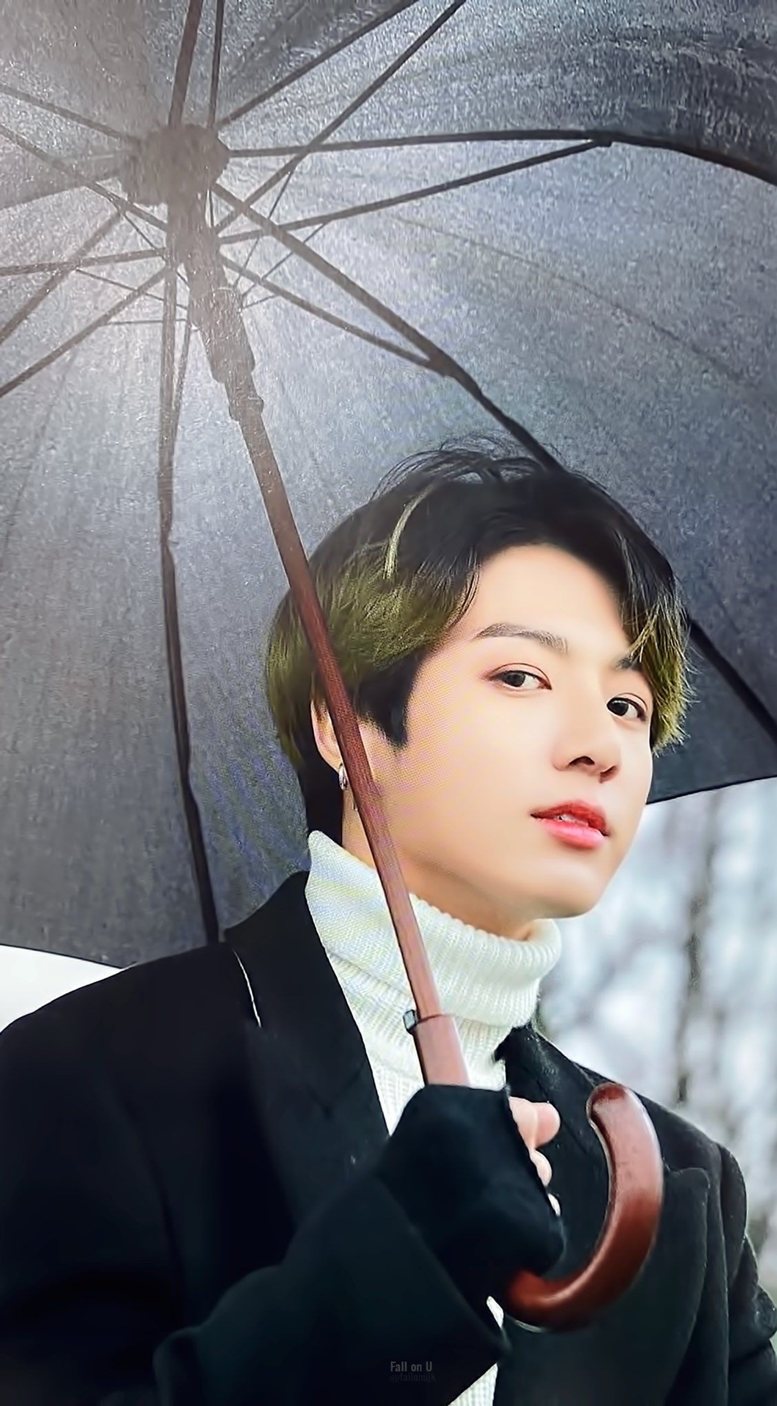 There is a man holding an umbrella in the snow (army, bangtan, boys, bts, cooky)