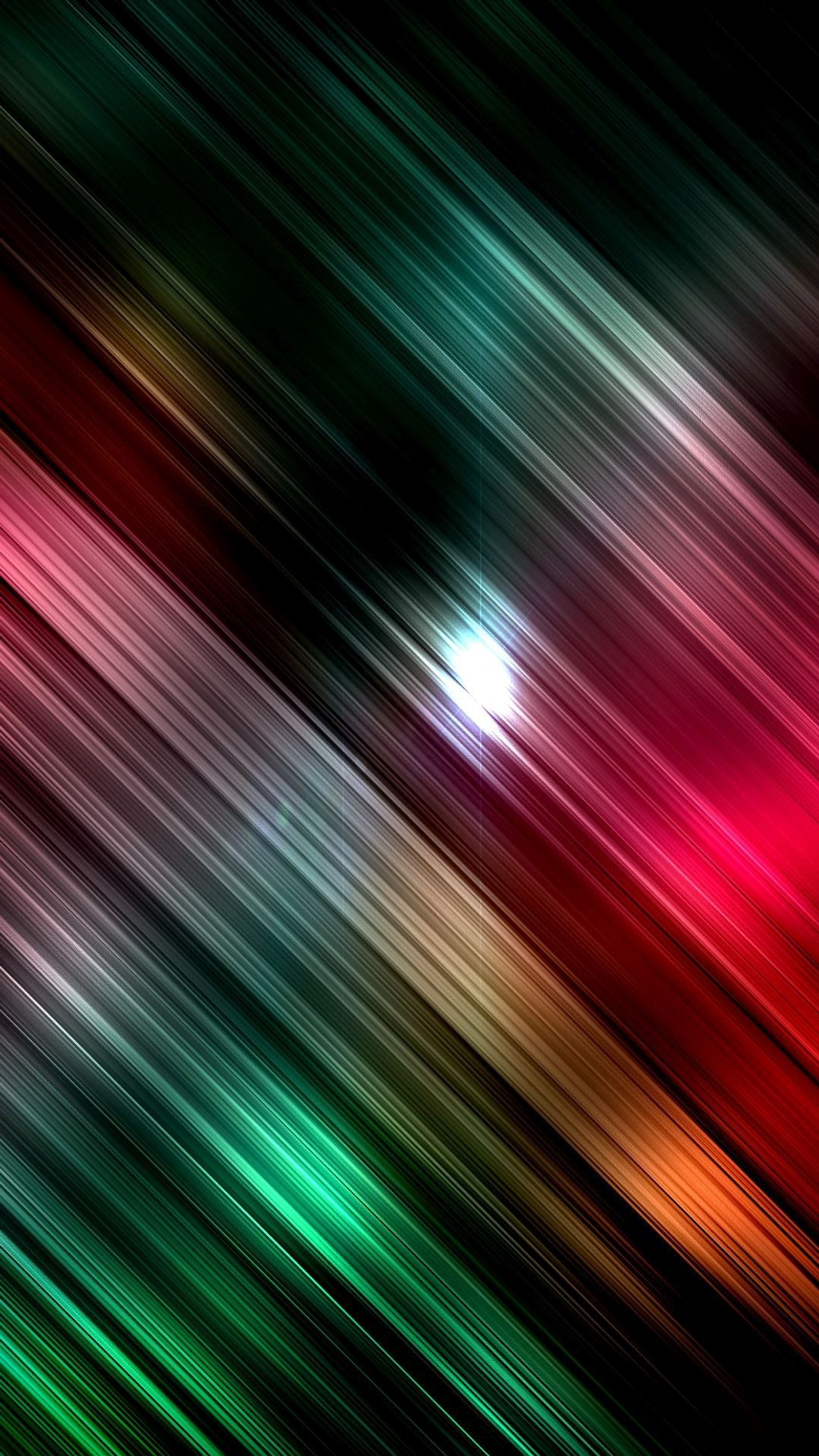 A close up of a colorful background with a blurry effect (color, streaks)