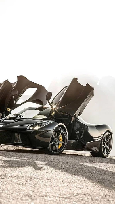 Sleek Black Ferrari with Open Doors Against a Bright Background