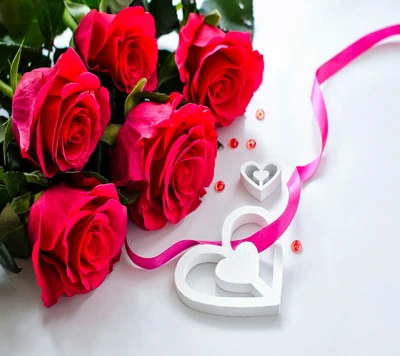 Vibrant Pink Roses with Decorative Hearts and Ribbon