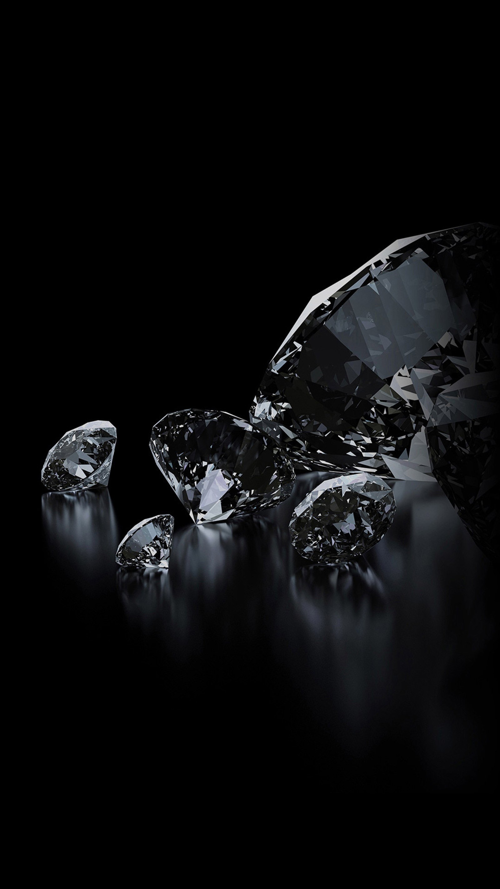 A close up of a group of diamonds on a table (diamond, black, jewellery, ring, liquid)