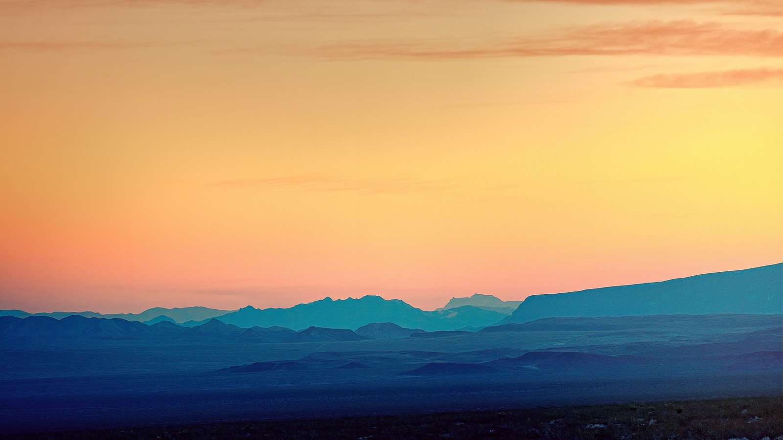 Mountains in the distance with a sunset sky in the background (mountains, landscape, evening sky, dusk, nature)