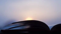 Morning Light Over an Open Book Against a Blue Sky