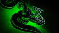 Beleuchtetes Razer-Logo in grünem Neon mit strukturierten Details