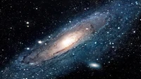 Stunning View of the Andromeda Galaxy Illuminated by Stars