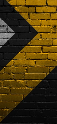 Geometric Brick Wall with Yellow and Grey Triangles