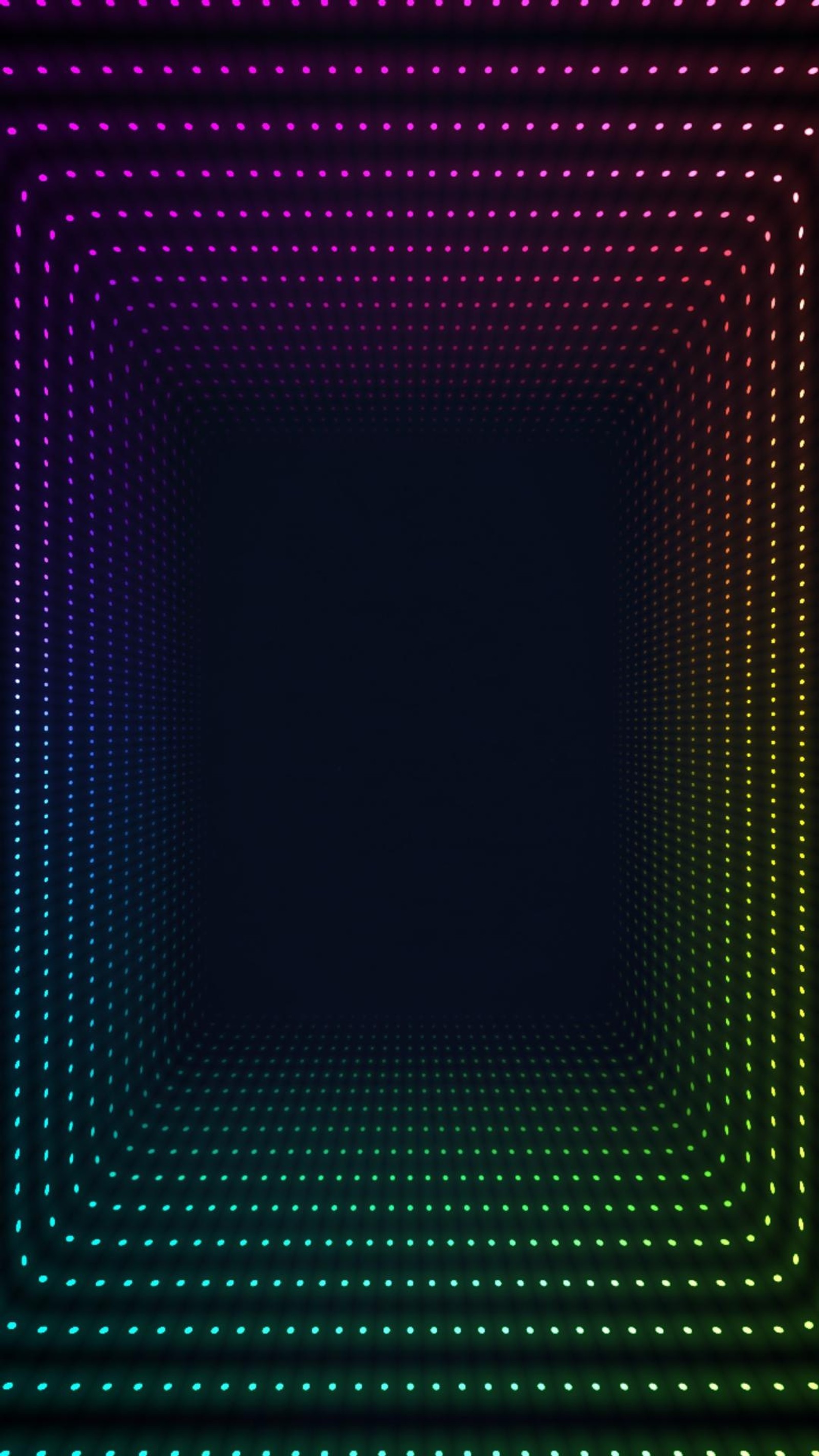 A close up of a colorful light tunnel with a black background (neon, tunnel)