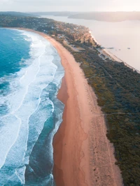 Stunning Aerial View of a Serene Coastal Headland and Shoreline