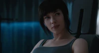 Scarlett Johansson as Motoko Kusanagi in a captivating moment from 'Ghost in the Shell'.