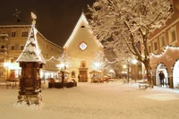 Pays des merveilles d'hiver enchanteur : Nuit de Noël dans une place de village enneigée