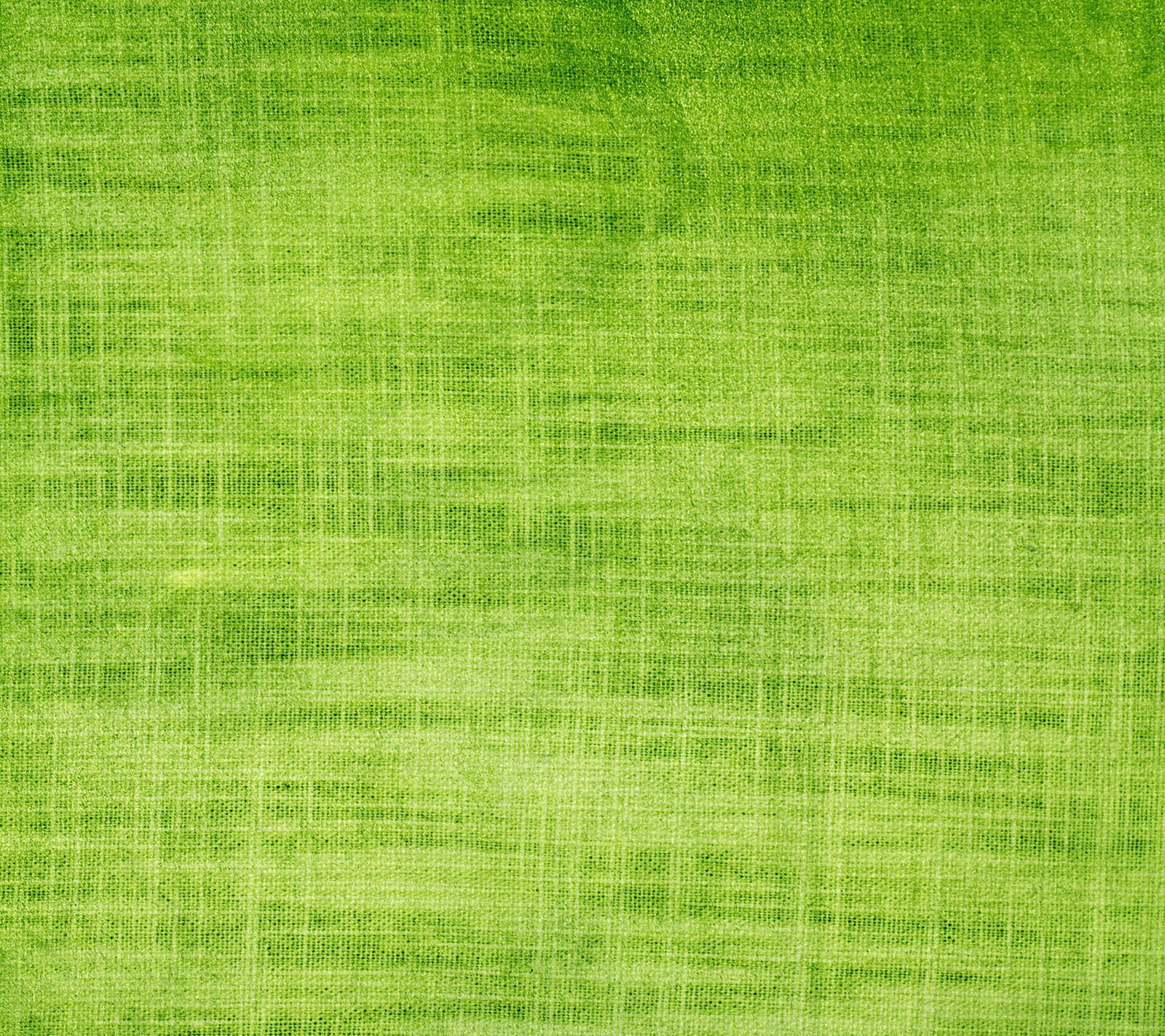 Un primer plano de un fondo verde con una textura muy rugosa (verde, hilos)