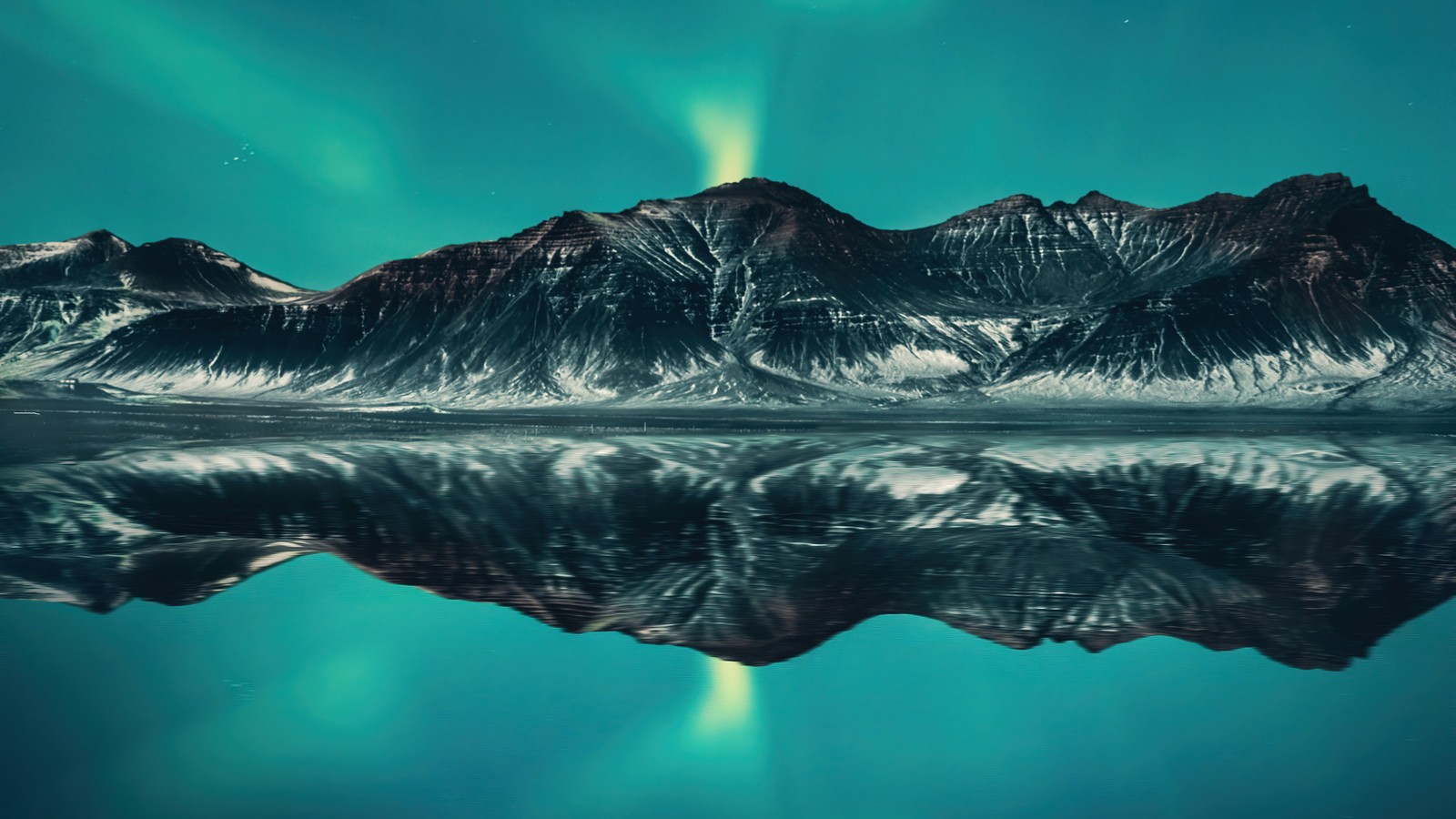 A view of a mountain range with a green aurora light in the sky (aurora borealis, iceland, sky, mountain, mountains)