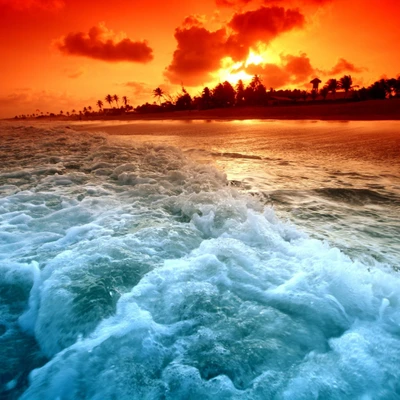 Vibrant Sunset Over Ocean Waves