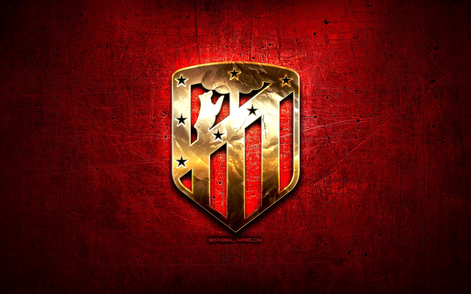 Uma parede vermelha com um emblema dourado nela (atletas, atlético, atletico, atletico madrid, clube)