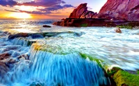 Sunset Waves Caress Rocky Shoreline