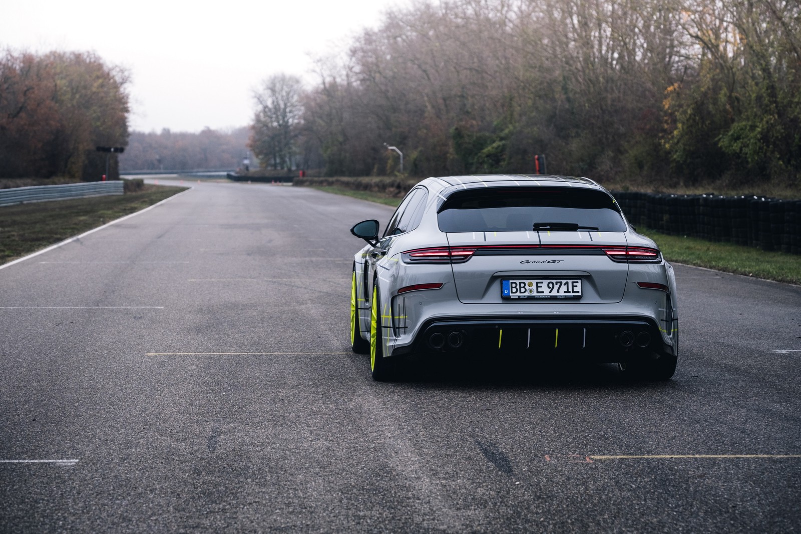 A close up of a car parked on a road near a forest (porsche, car, techart, sports car, supercar)