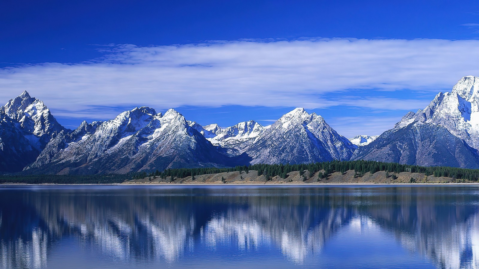 Arafed mountain range reflected in a lake with a blue sky (mountain, mountains, lake, scenery, grand teton)