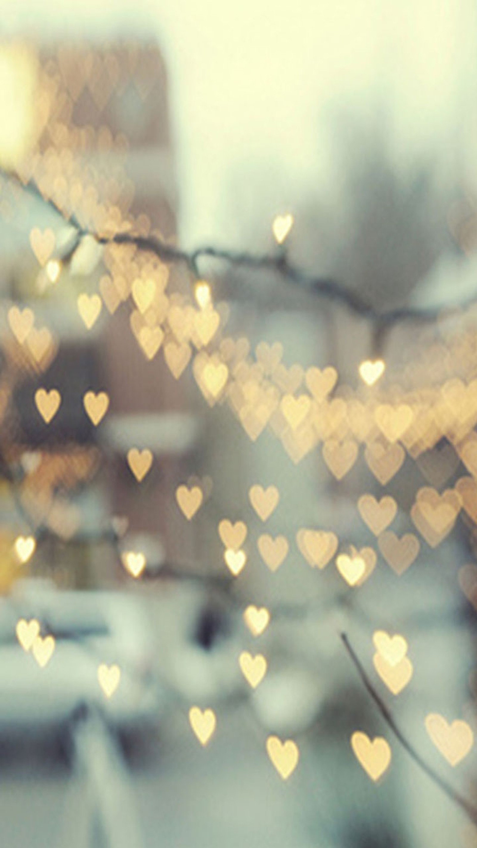 There are many hearts that are hanging from a tree (hearts, lights)