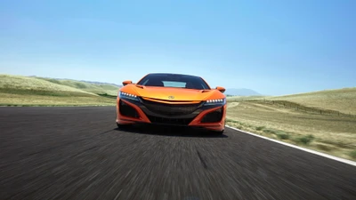 Dynamic Orange Acura Sports Car on Open Road