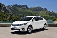 Berline Toyota Corolla dans un paysage pittoresque