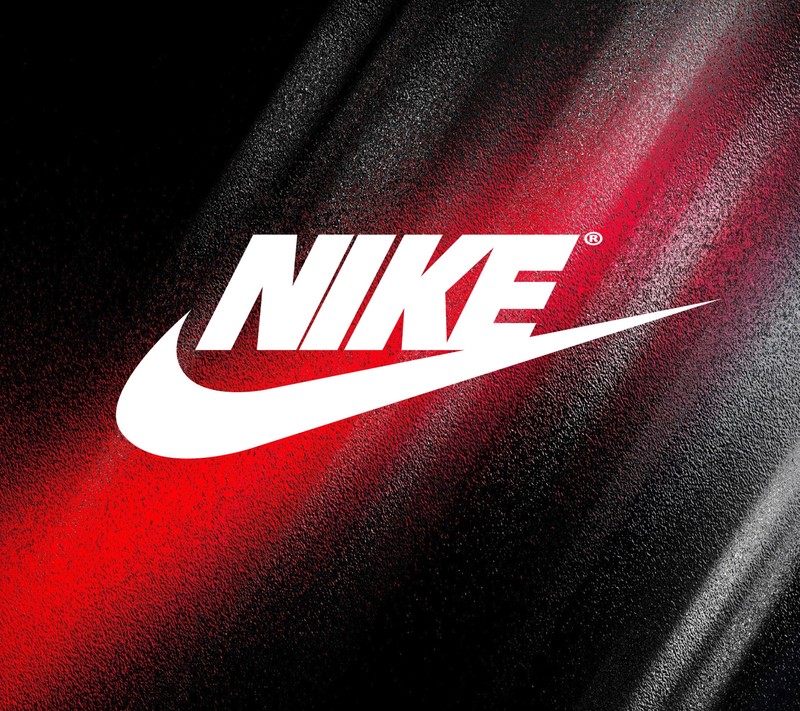 Близкий план красно-черного логотипа nike на черном фоне (абстракция, логотипы, nike, спрей, spray)