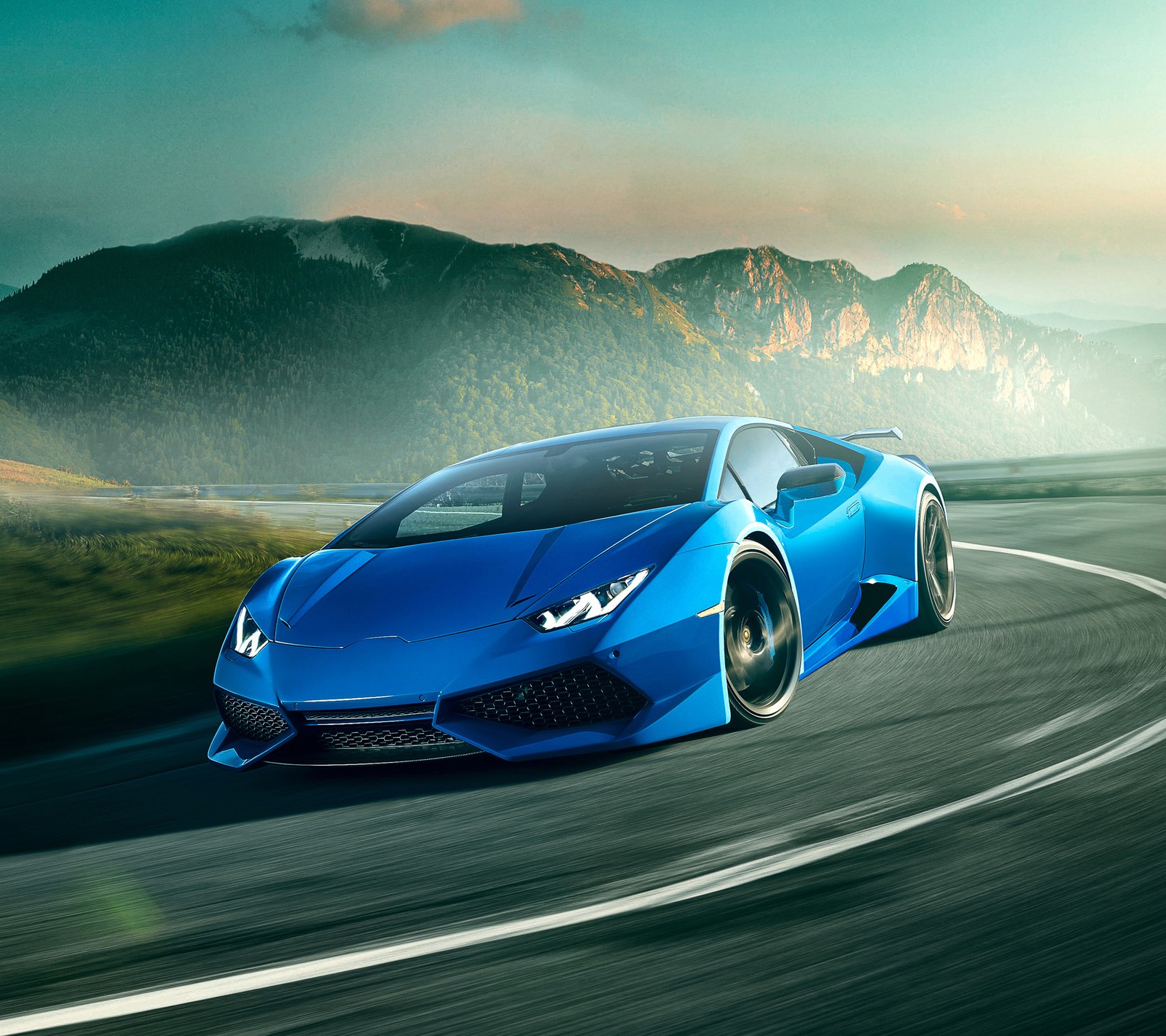 Un coche deportivo azul conduciendo por una carretera con montañas al fondo (azul, huracan, lambo, lamborghini, supercoche)