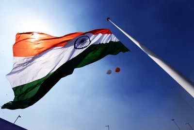 Waving Indian Flag Against a Bright Sky