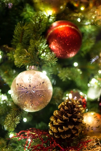 Festive Ornaments and Lights on a Christmas Tree