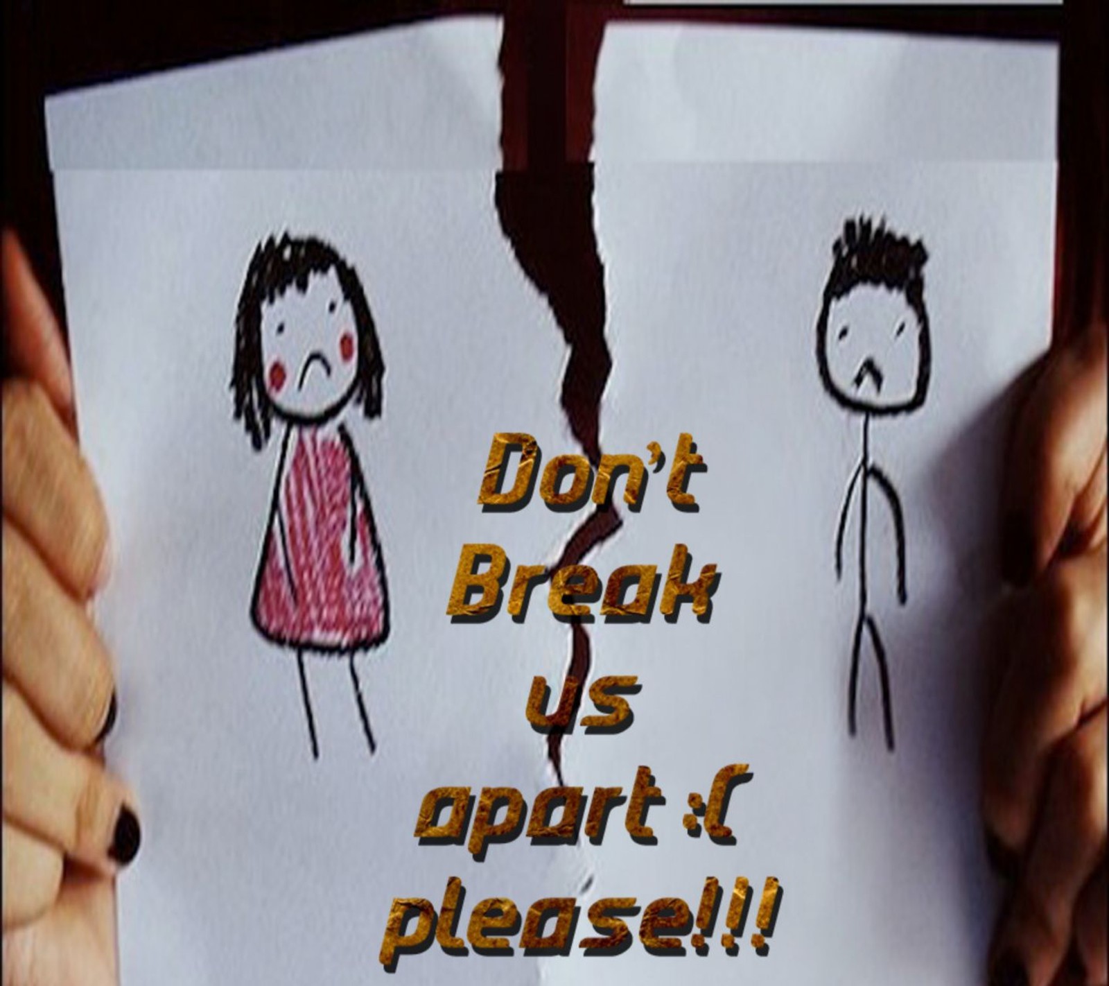 Someone holding a piece of paper with a drawing of a girl and a boy (apart, break, feelings, friends, hurt)