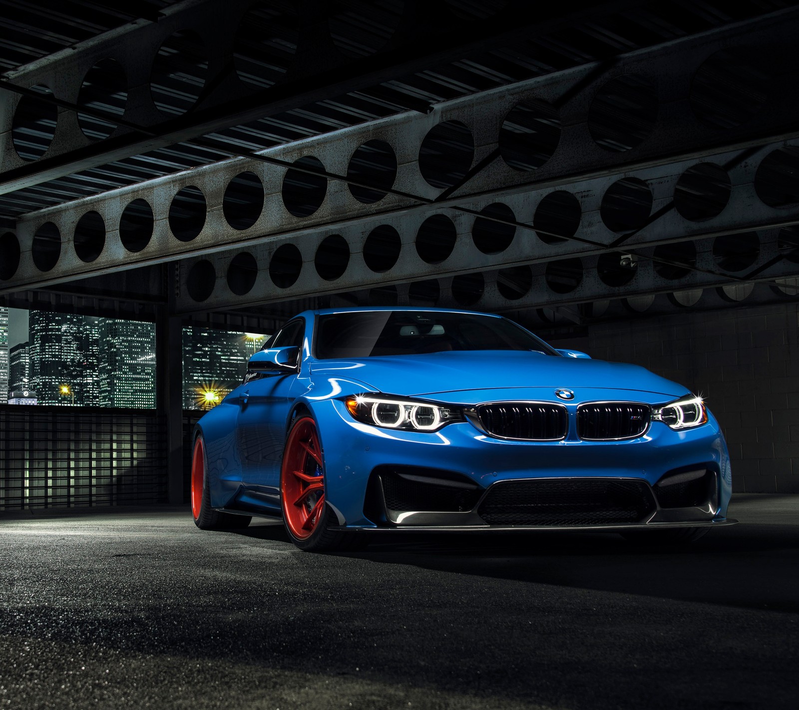 A close up of a blue bmw car parked in a parking garage (auto, bimmer, bmw, car, m4)