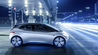 Volkswagen ID.3 : Une Voiture Électrique Compacte Moderne dans un Paysage Nocturne Urbain