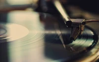 Close-Up of a Vinyl Record Playing on a Phonograph