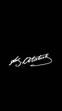 Signature of Mustafa Kemal Atatürk on a black background.