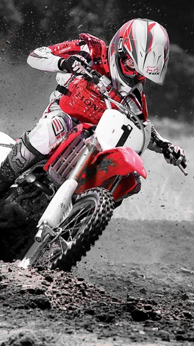 Intense Motocross Action: Rider Dominating the Dirt Track