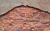 Weathered Brick Wall with Exposed Texture