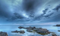 Tranquil Coastal Horizon Under a Cloudy Sky