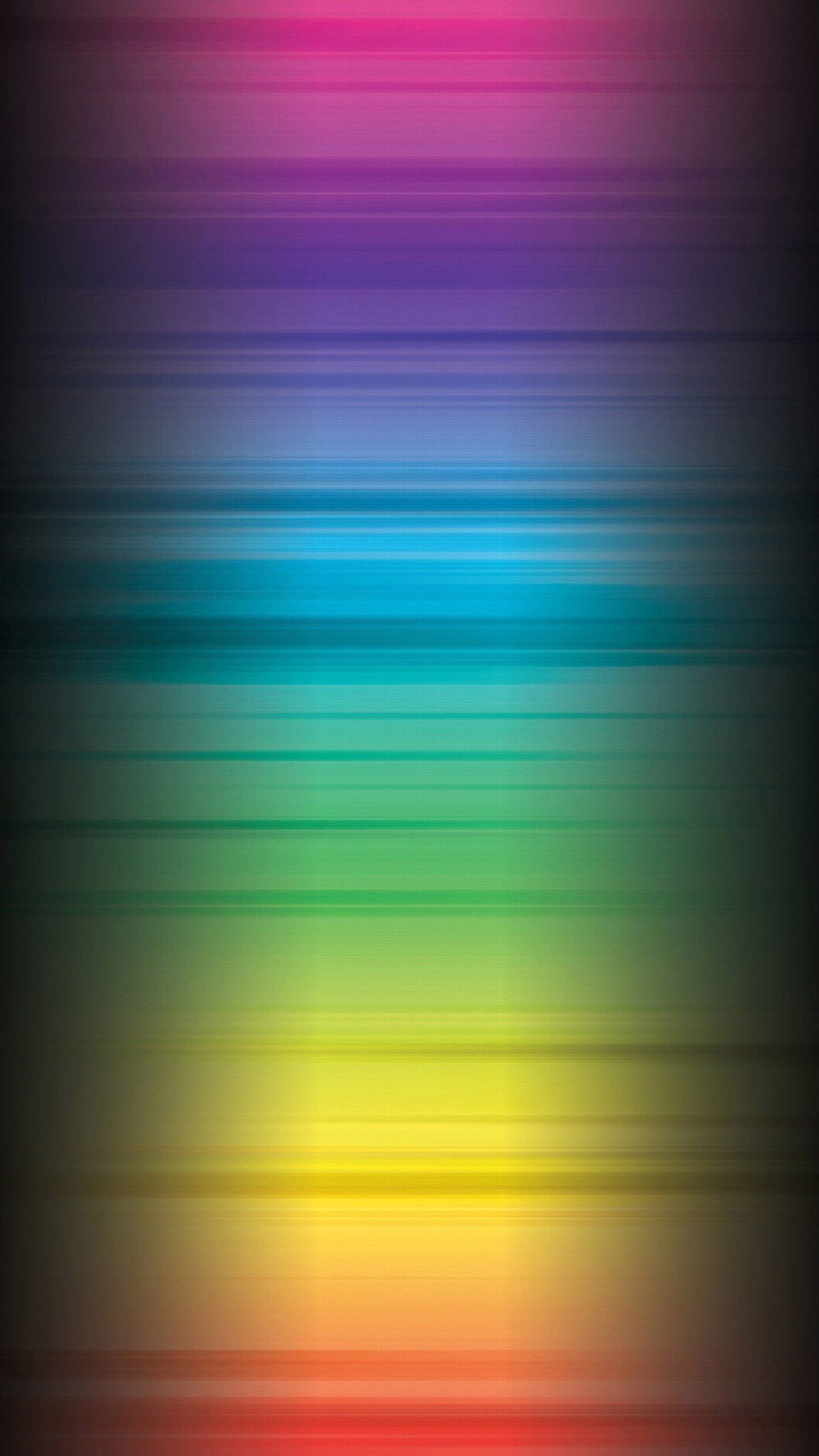 A close up of a blurry background of a rainbow colored background (color, fade)