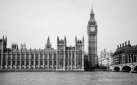 Casas do Parlamento e Big Ben em monocromático ao longo do rio Tâmisa.