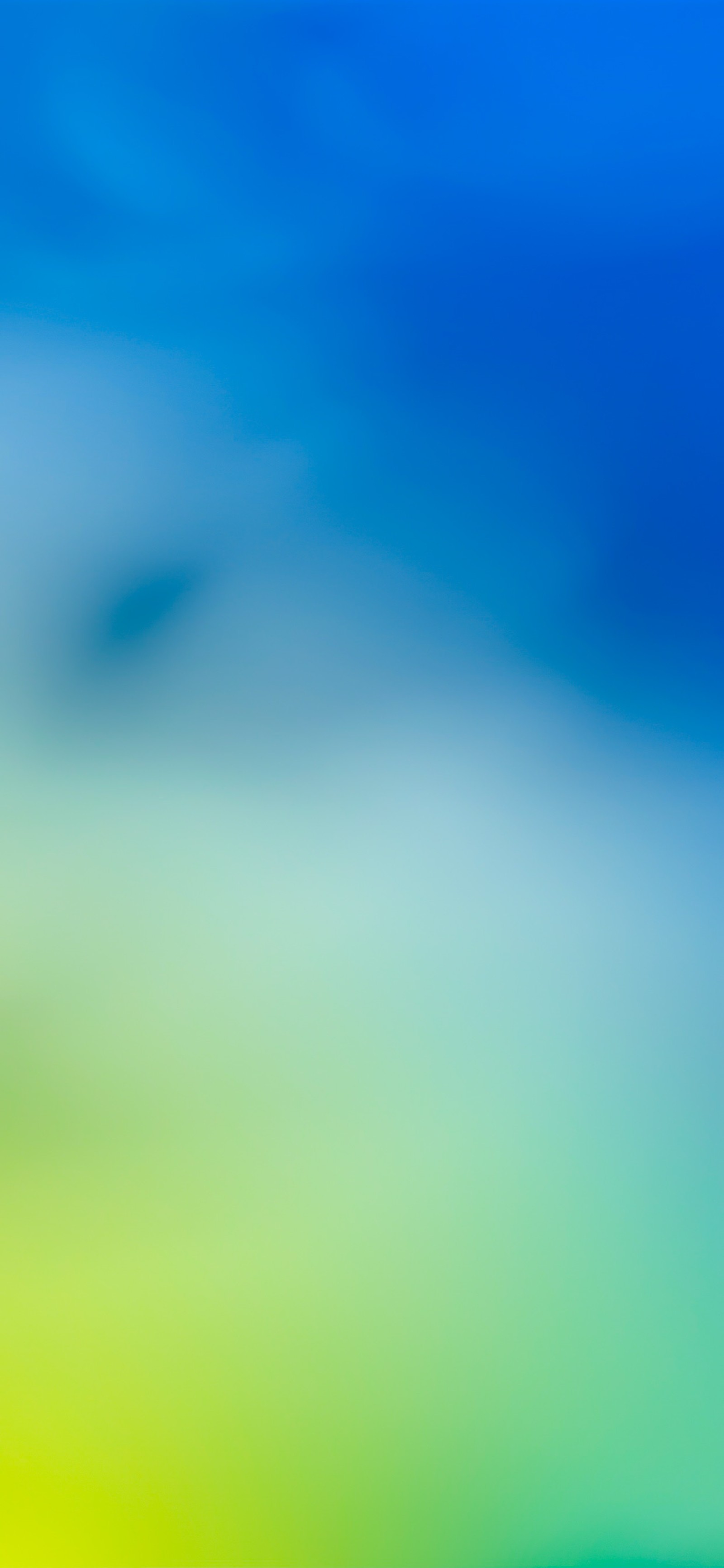 Blurred background of a blue and yellow sky with clouds (ios 15, apples, ios, blue, azure)