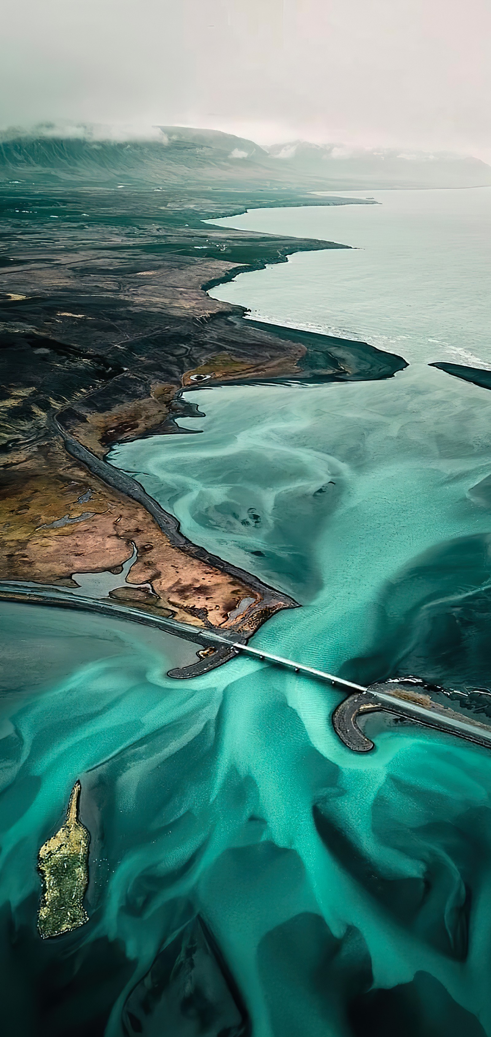 Aerial view of a long bridge over a body of water (sea, internet meme, water, water resources, azure)