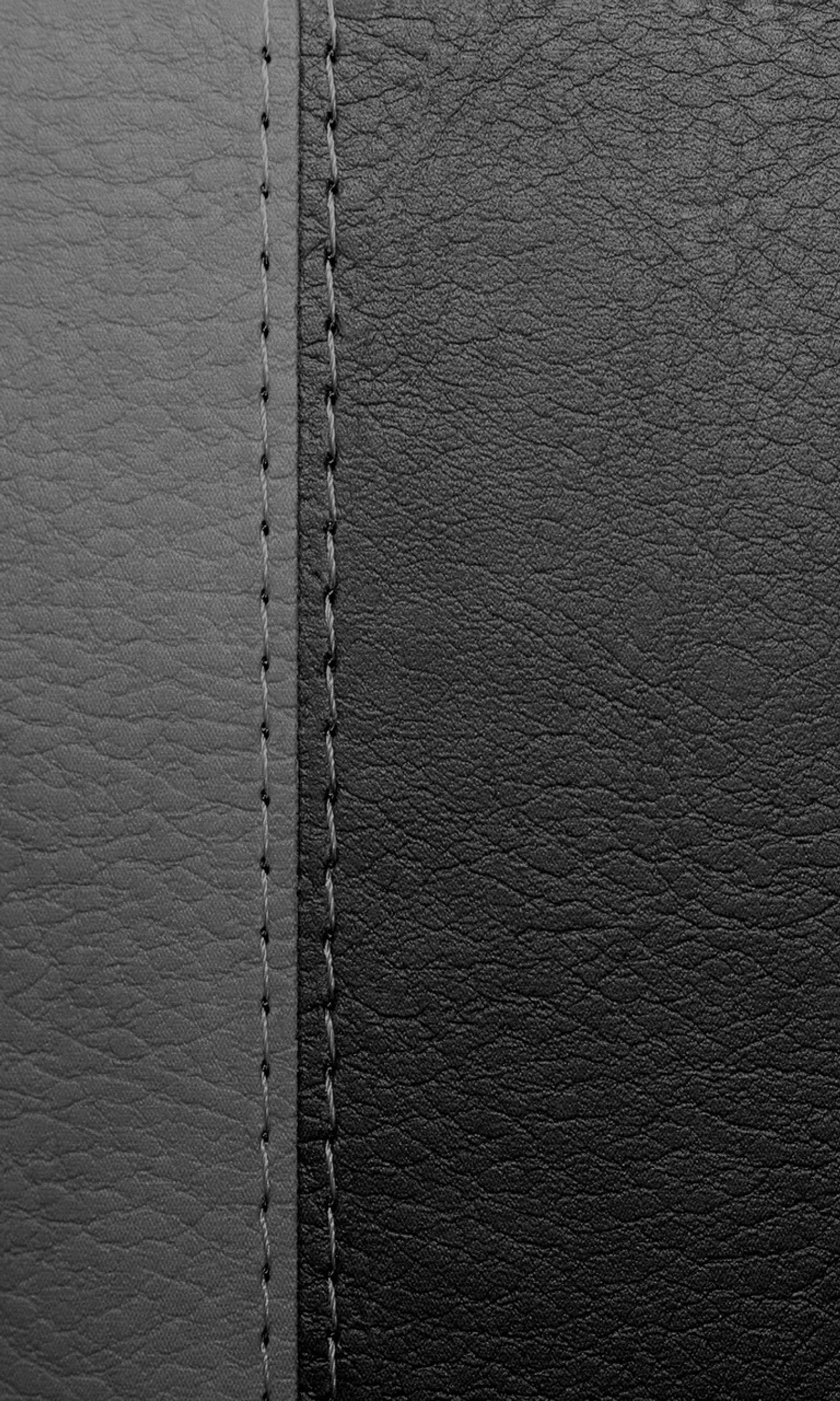 A close up of a black leather background with stitching (background, black leather)