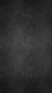 Textured black diamond plate background.