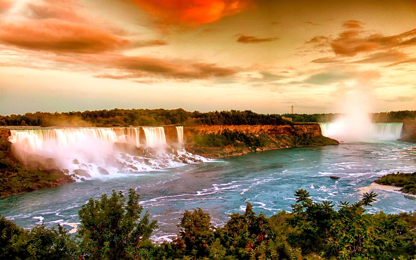 Vista de una cascada con un arcoíris en el cielo (cataratas americanas, río niágara, cascada, cuerpo de agua, naturaleza)