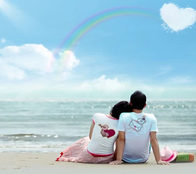 Couple romantique s'embrassant sous un arc-en-ciel au bord de la mer