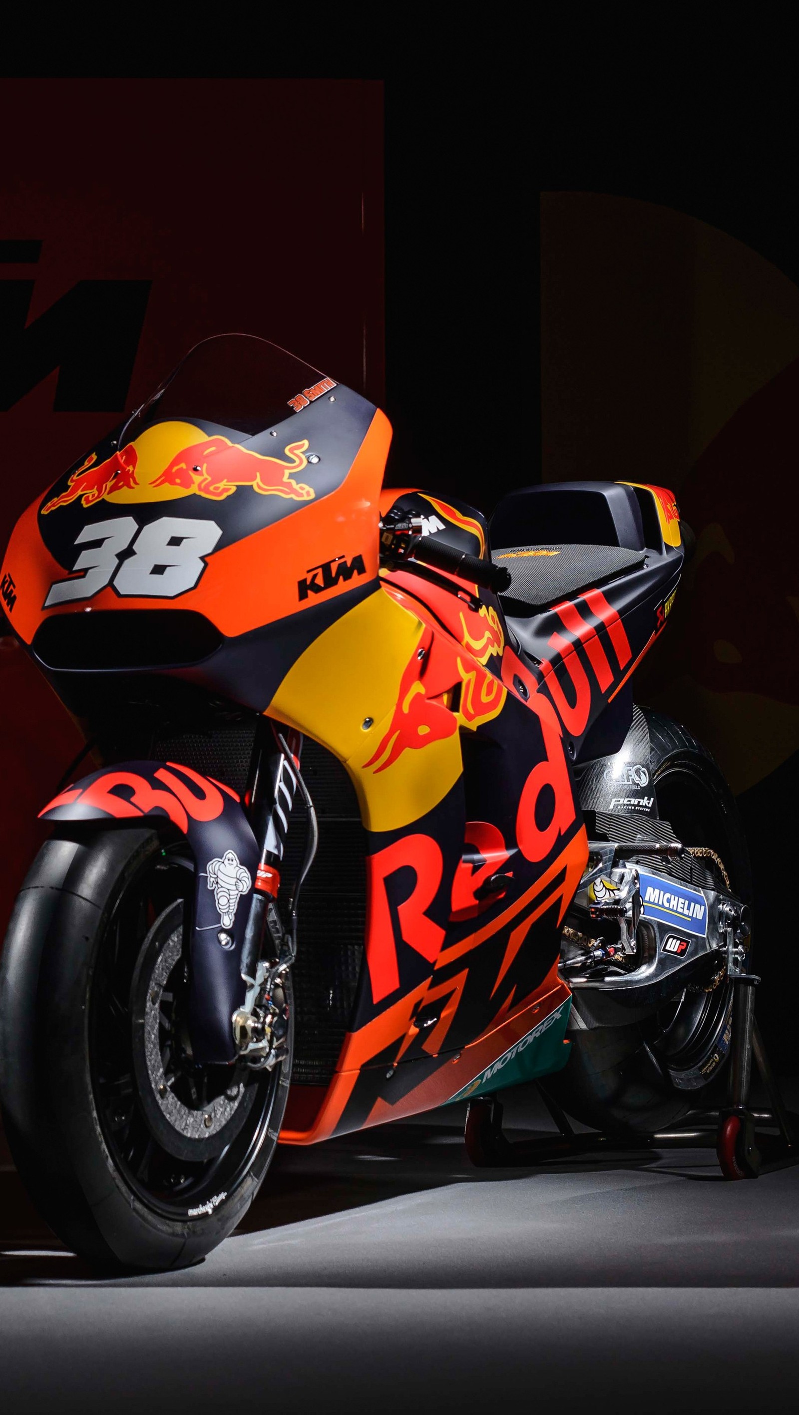 Una motocicleta con un logo de red bull en el costado (bicicletas, ktm rc16 motogp 2017, raza)