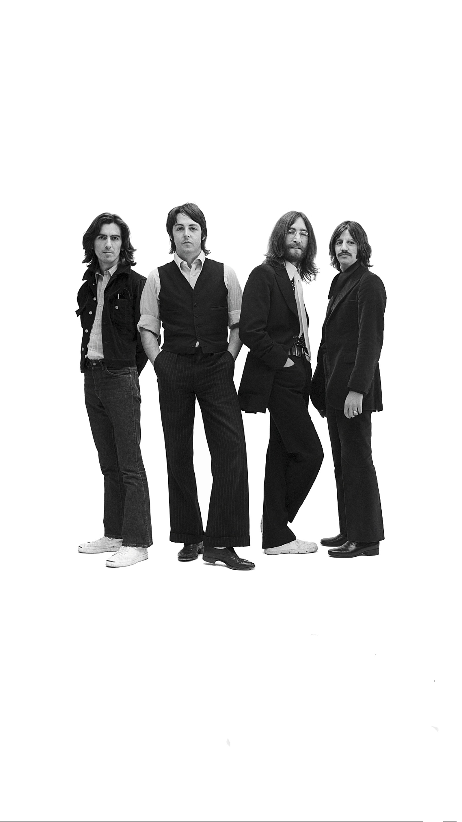 Arafed black and white photograph of a group of people standing together (george, john, paul, ringo, the beatles)