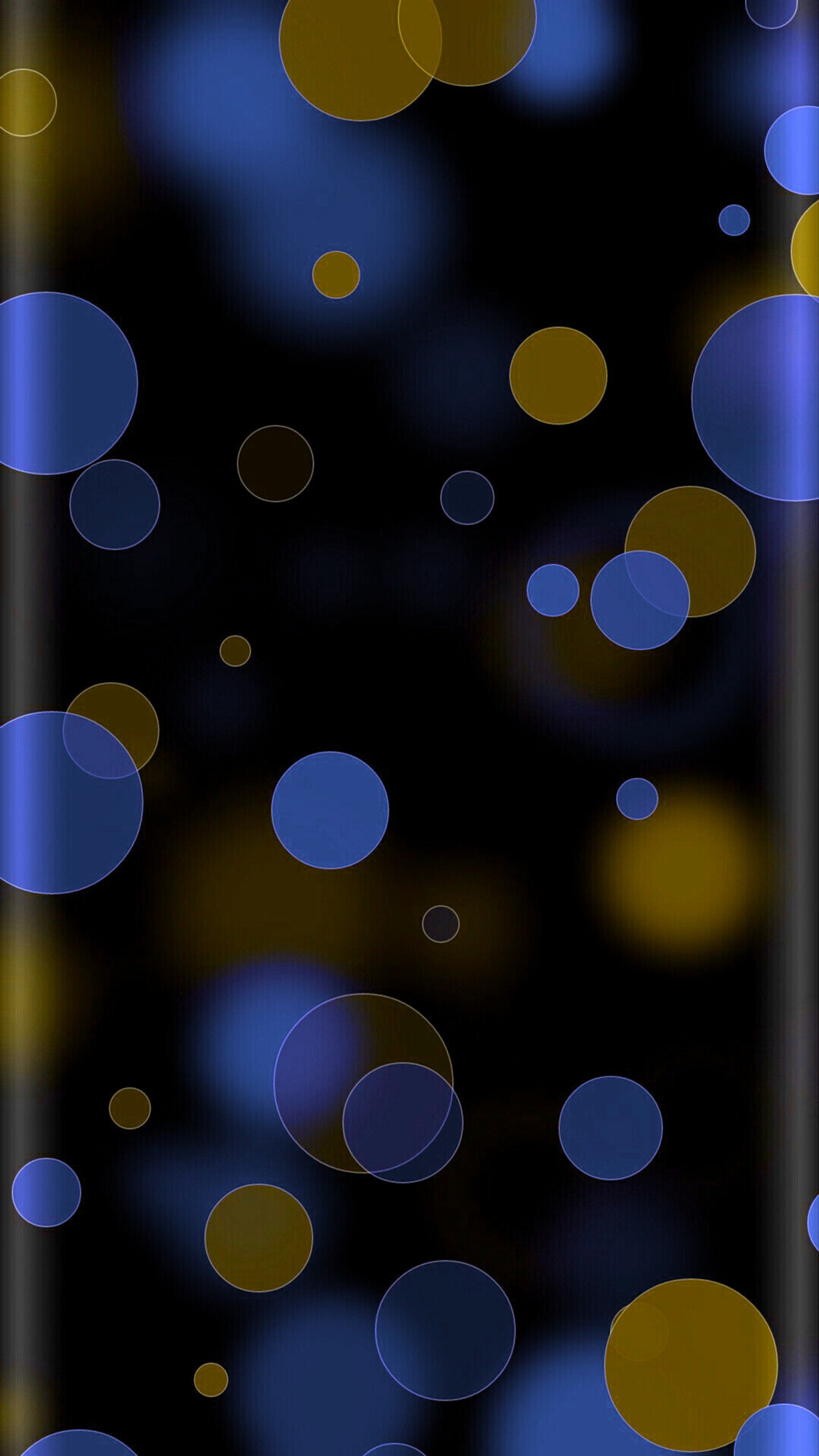 Un primer plano de un teléfono celular con un fondo azul y amarillo (abstracto, círculo, diseño, borde, púrpura)