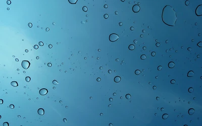 Blue Sky with Raindrops: A Serene Liquid Landscape