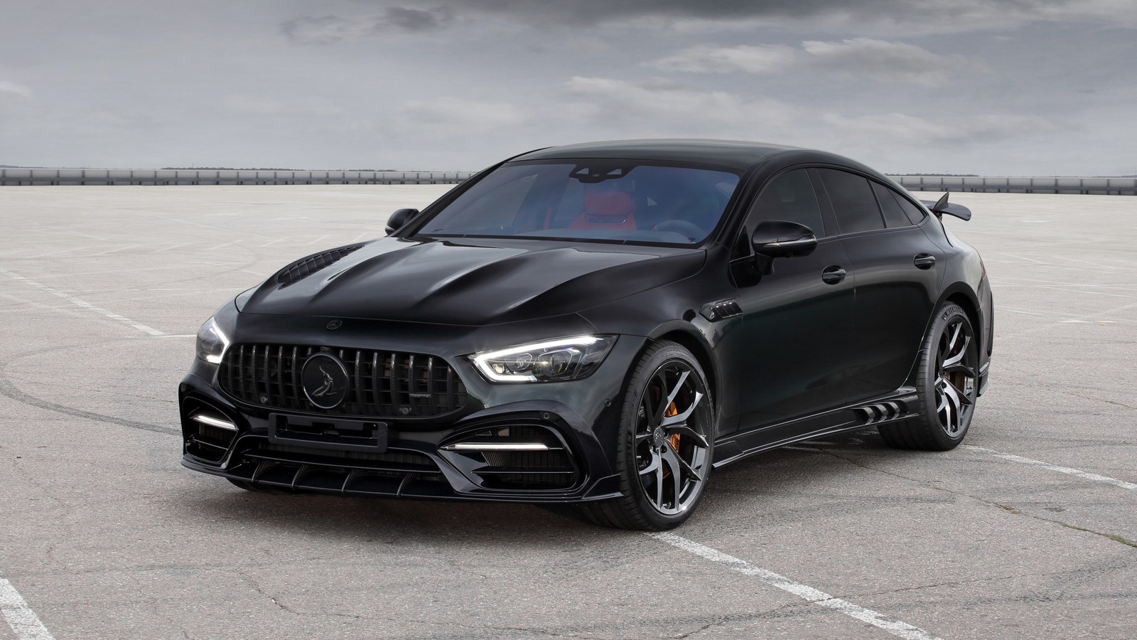 A black mercedes amg gts is parked in a parking lot (cars, mercedes benz, mercedes benz s class, kick, mercedes amg)