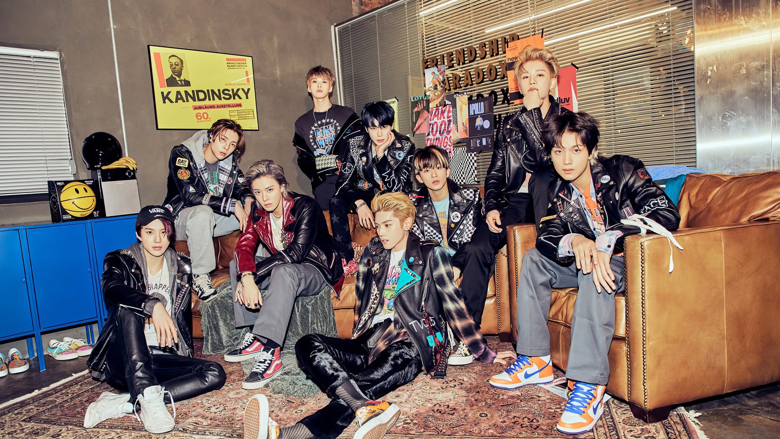 Arafed group of young men sitting on a couch in a room (nct 127, 엔씨티 127, kpop, k pop, neo zone)